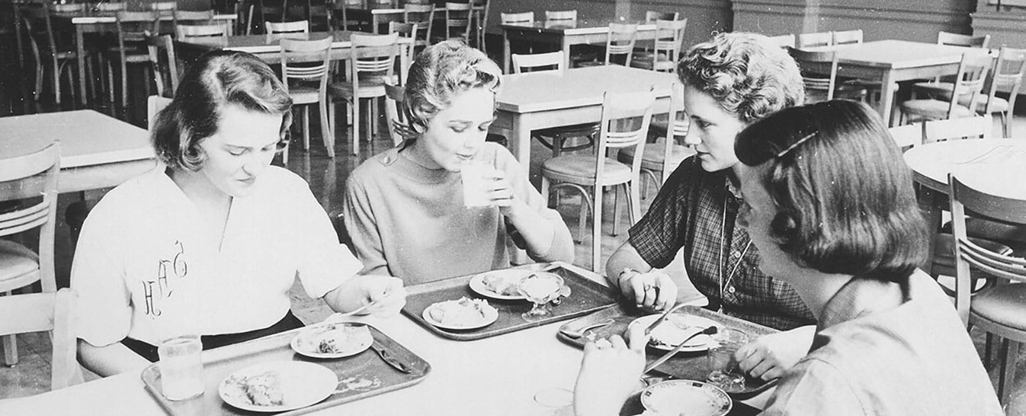 Maryville alums eating lunch in cafeteria during the 70s